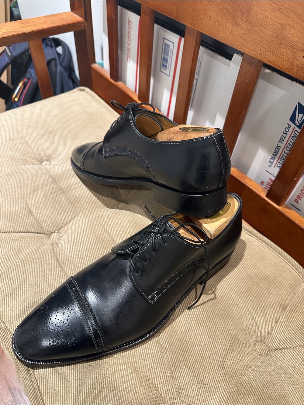 Santoni dress shoes feature a distinct toe medallion. - Picture 2 of 14